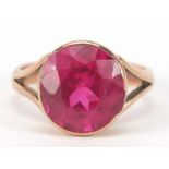 9ct rose gold ruby solitaire ring, the stone approximately 10mm in diameter, size H, 3.6g : For