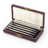 Set of four sterling silver playing card suit propelling pencils housed in a velvet and silk lined