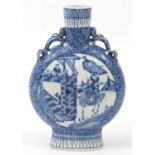 Large Chinese blue and white porcelain moon flask hand painted with warriors in a palace setting,