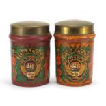 Pair of Continental hand painted pottery tobacco jars with brass lids, each 23.5cm high : For