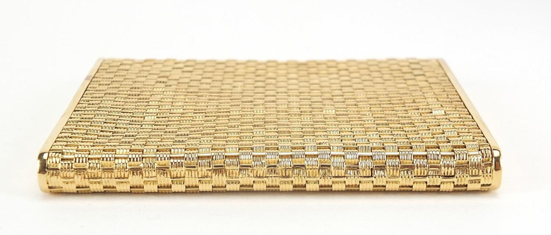 18ct gold basket weave design cigarette case with blue sapphire push button, marked 750 to the - Image 6 of 8