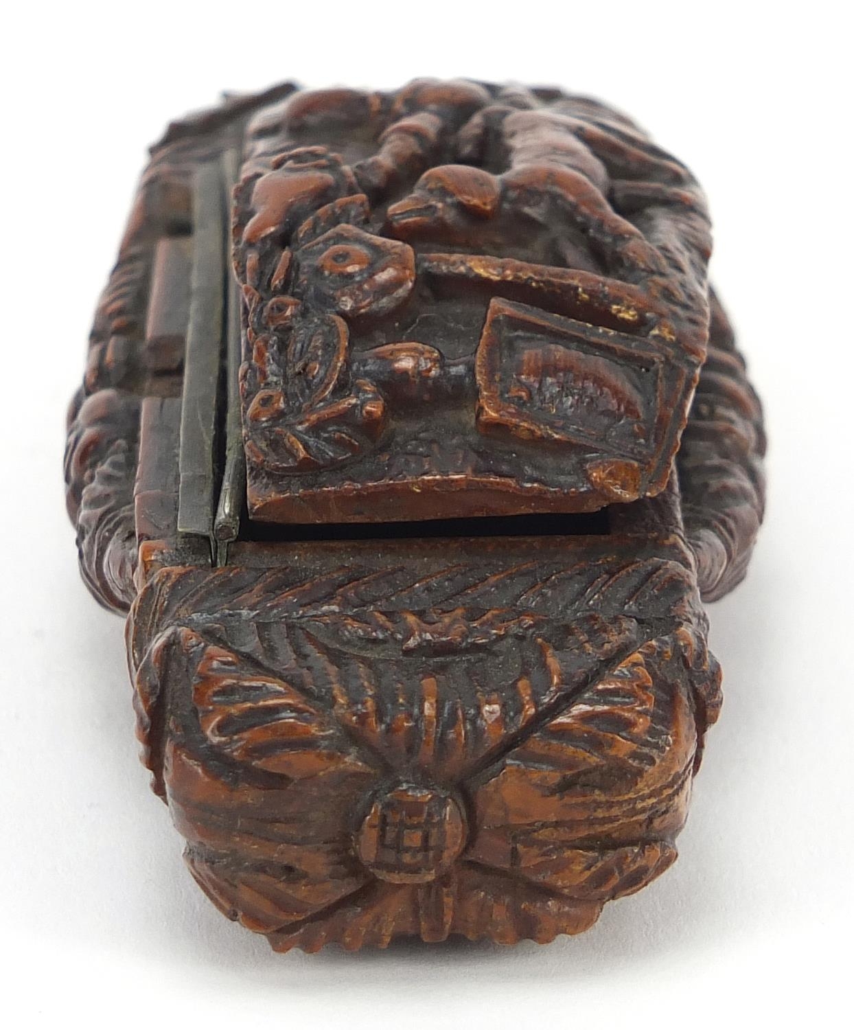 Antique coquilla nut snuff box carved with figure and dog beside a tree and an Irish rose, 10cm wide - Image 6 of 14