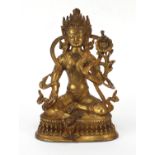 Chino-Tibetan gilt bronze figure of seated Buddha, 22cm high : For Further Condition Reports