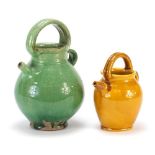 Two Christopher Dresser style pottery spouted vessels, the largest 25cm high : For Further Condition