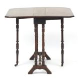 Edwardian walnut Sutherland table, 63cm high : For Further Condition Reports Please Visit Our