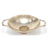 Thomas Bradbury & Sons Ltd, Arts & Crafts circular silver shallow dish with twin handles set with