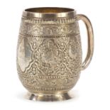 William Hutton & Son, Victorian silver tankard profusely engraved in the Persian style with birds of