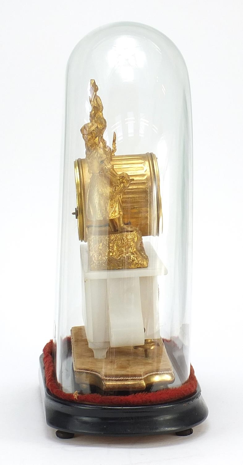 19th century French gilt metal and onyx figural mantle clock raised on a gilt plinth base, housed in - Image 6 of 6