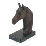 Patinated bronze horsehead raised on a rectangular marble base, 19cm high : For Further Condition