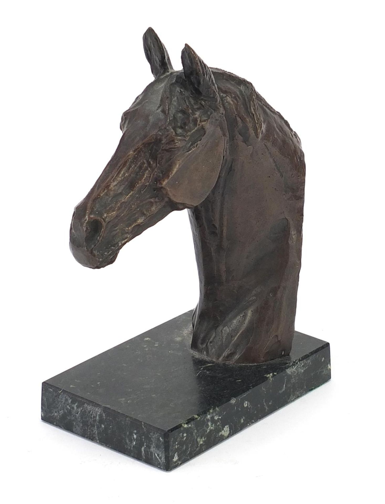 Patinated bronze horsehead raised on a rectangular marble base, 19cm high : For Further Condition