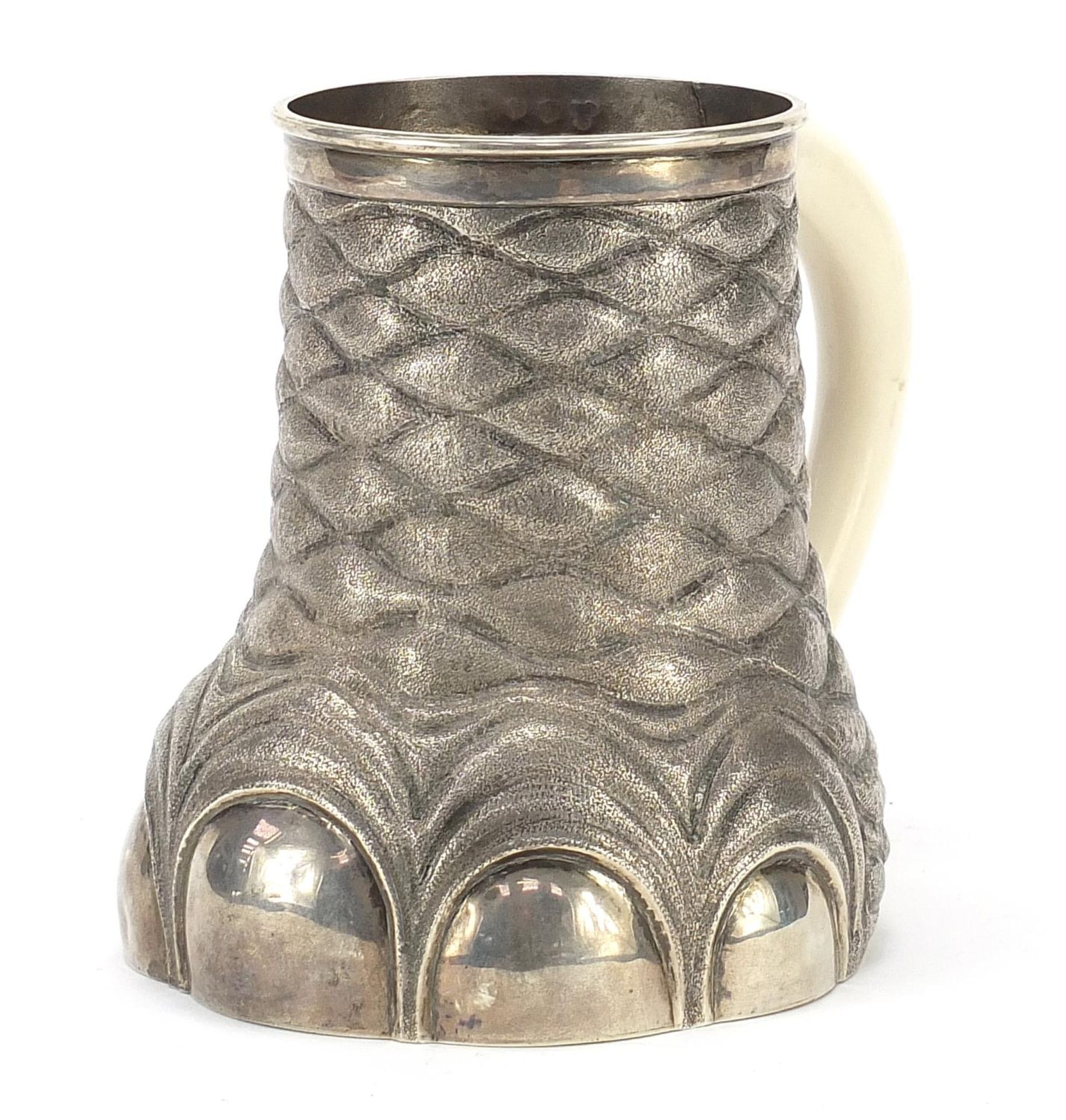 Indian silver tankard in the form of an elephant's foot, with ivory handle, possibly Calcutta,