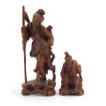 Two Chinese root wood carvings including one of a fisherman, the largest 23cm high : For Further