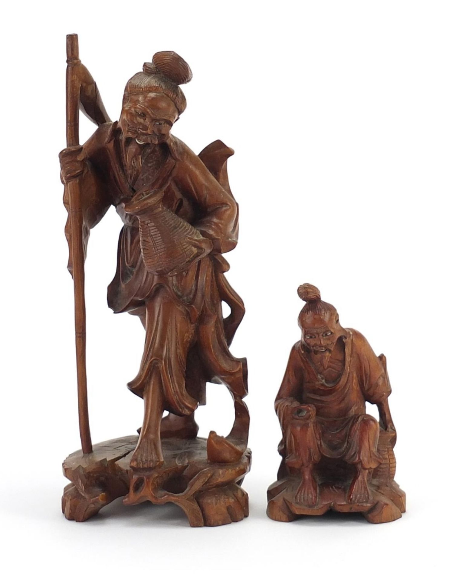 Two Chinese root wood carvings including one of a fisherman, the largest 23cm high : For Further