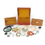 Vintage and later jewellery including silver brooches and shell necklaces housed in a tooled leather