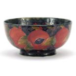 William Moorcroft Pomegranate pattern bowl, impressed and painted marks to the base, 21.5cm in