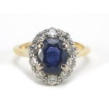 18ct gold sapphire and diamond ring, the sapphire approximately 8.5mm x 6.8mm, the diamonds