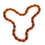 Amber coloured bead necklace, 84cm in length, 202.5g : For Further Condition Reports Please Visit