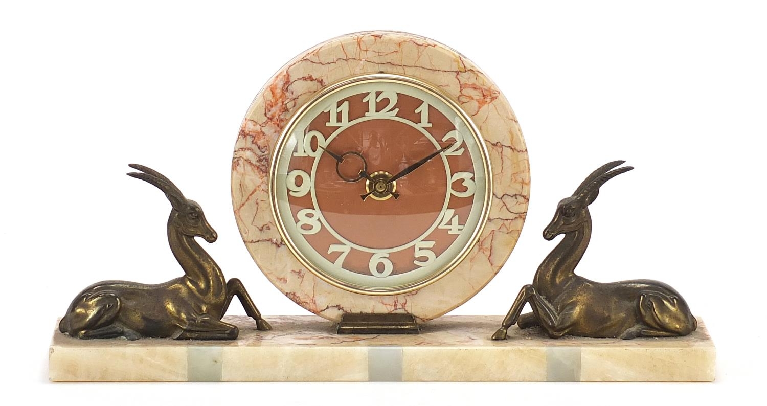 French Art Deco marble gazelle design mantle clock with circular dial and chapter ring having Arabic