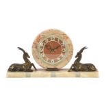 French Art Deco marble gazelle design mantle clock with circular dial and chapter ring having Arabic