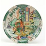 Chinese porcelain plate hand painted in the famille verte palette with warriors in a palace setting,