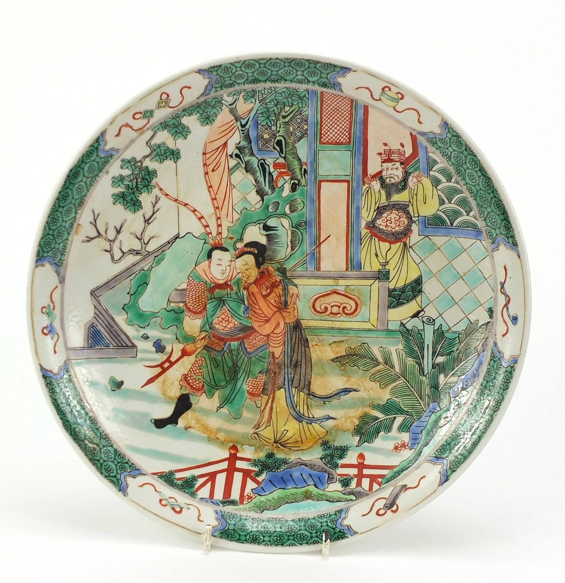 Chinese porcelain plate hand painted in the famille verte palette with warriors in a palace setting,