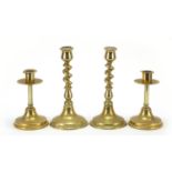 Two pairs of 19th century brass candlesticks including a barley twish pair, the largest 22cm