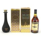 Three vintage bottles of cognac, two with boxes, one sealed, comprising Otard XO, Hennesey Very