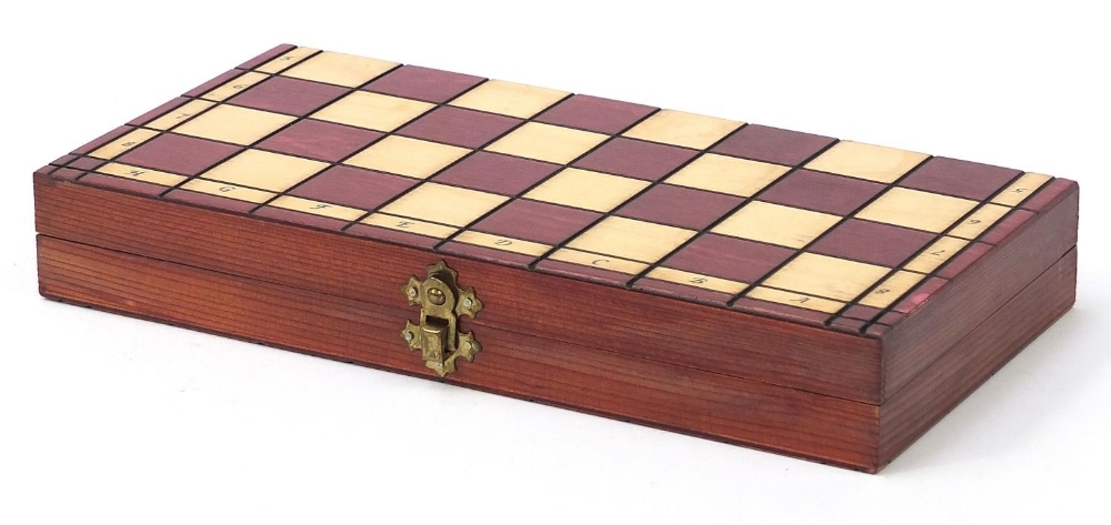 Carved wood half stained chess set with fitted folding chess board, the largest pieces each 6.5cm - Image 8 of 10