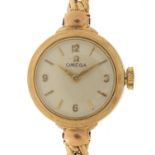 Omega, ladies 9ct gold manual wind wristwatch with 9ct gold strap, the movement numbered 16425764,