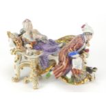 Meissen, 19th century German porcelain figure group on a chaise longue, 20cm in length : For Further