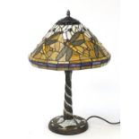 Bronzed Tiffany design leaded glass table lamp and shade decorated with dragonflies, 58cm high : For