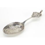 Victorian Continental silver spoon embossed with a figure with dog and squirrel handle, import marks