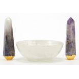 Pair of amethyst obelisk type specimens and a flourite stone bowl, the largest 10cm in diameter :