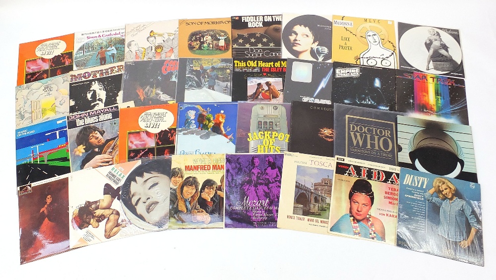 Vinyl LP's including Charlie Parker, Miles Davis and Dizzy Gillespie, Simon & Garfunkel, Isley