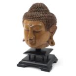 Thai carved wood Buddha head on ebonised base, 44cm high : For Further Condition Reports Please