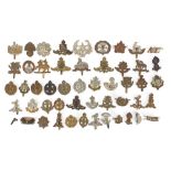 Collection of British military cap badges including Marines, RAF, Lincolnshire, Egypt, Army