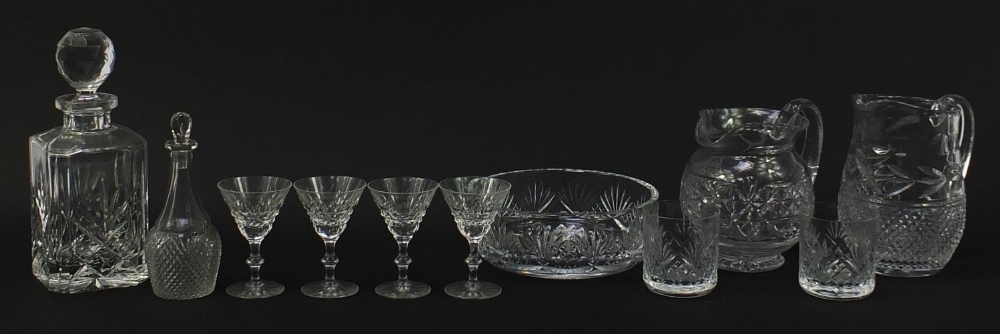 Cut crystal and glassware including decanter with stopper, jugs, tumblers and fruit bowl, the