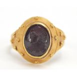 Antique unmarked gold intaglio silver ring carved with a gladiator head, (tests as 15ct+) size M,