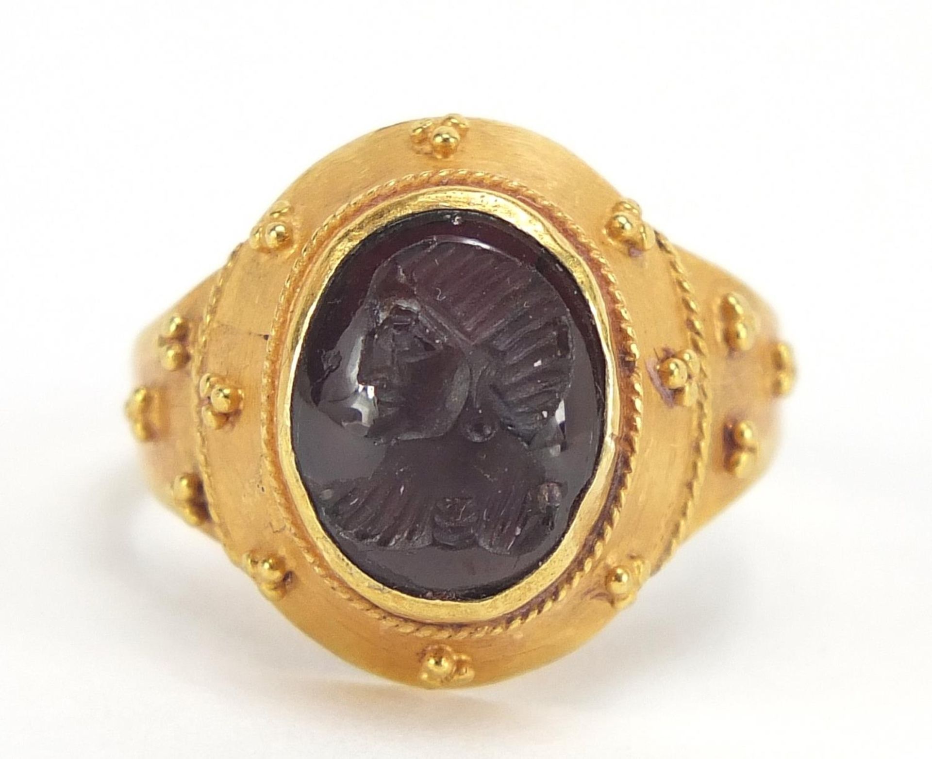 Antique unmarked gold intaglio silver ring carved with a gladiator head, (tests as 15ct+) size M,