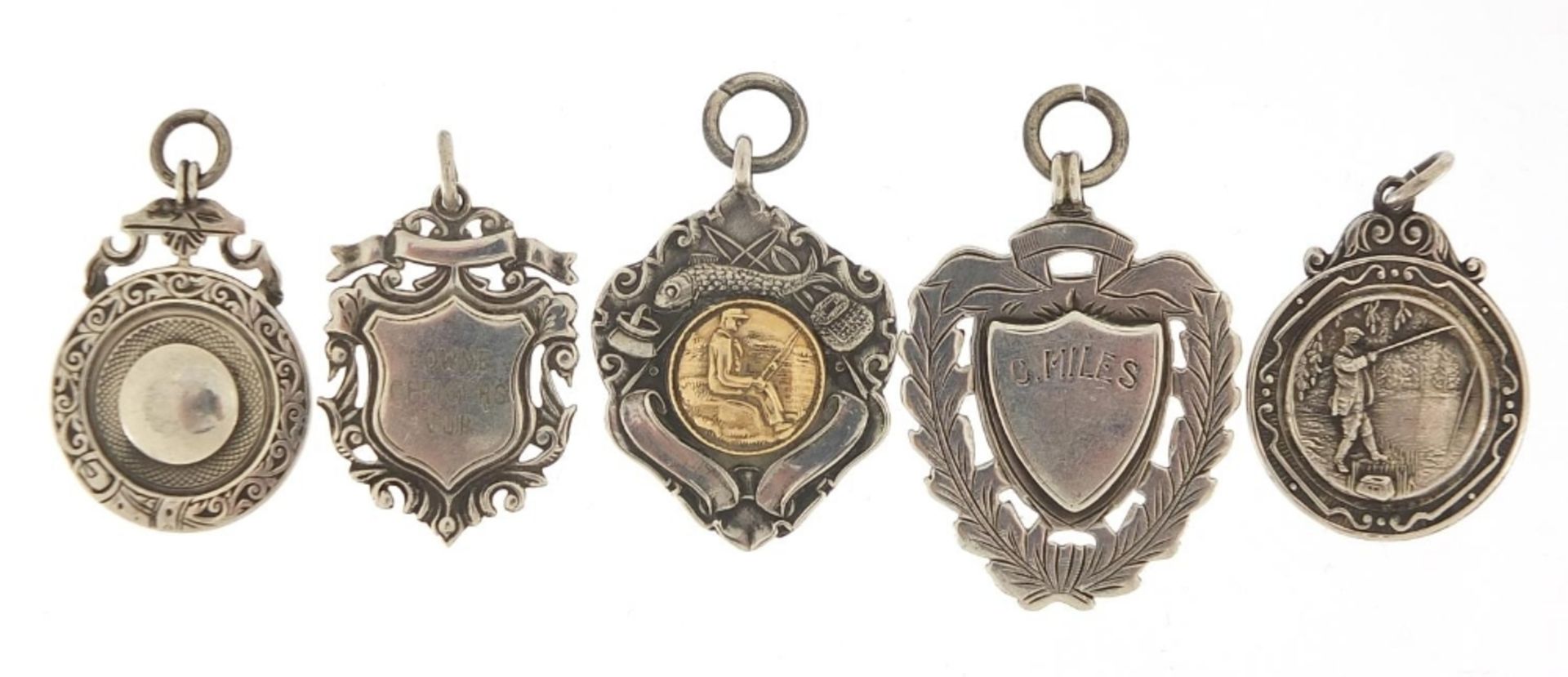 Five Edwardian and later silver sports jewels including Lowne Officer's Cup and London Angler's