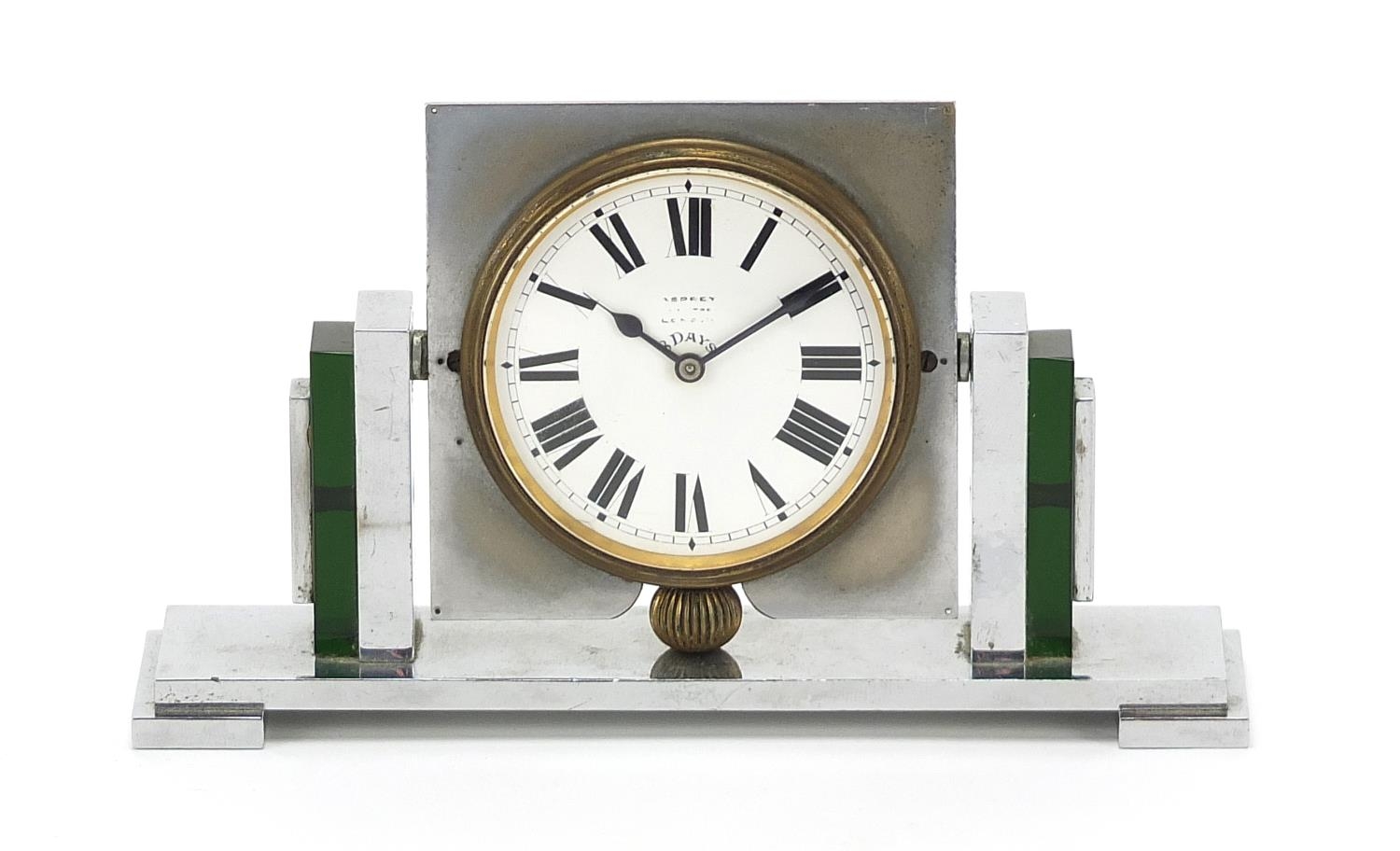 Art Deco chrome and Bakelite eight day desk clock retailed by Asprey of London, 16cm wide : For