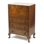 Art Deco burr walnut tallboy with a pair of cupboard doors above three drawers, 116.5cm H x 76.5cm W