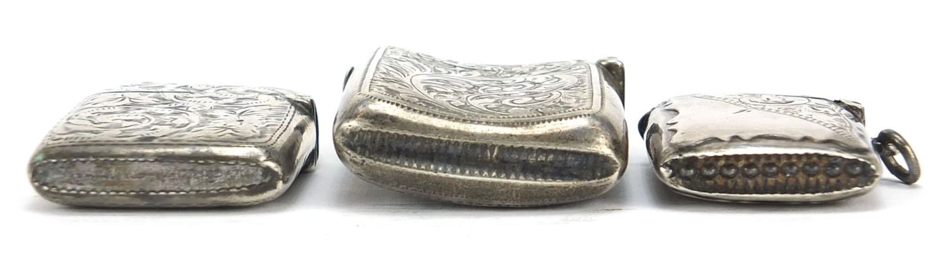 Three Victorian and later silver vestas with engraved decoration, Chester 1899, Birmingham 1898 - Image 9 of 14