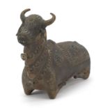 Indian bronzed study of a cow, 22cm in length : For Further Condition Reports Please Visit Our