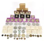Collection of British uncirculated and commemorative coinage including fifty pence pieces and crowns