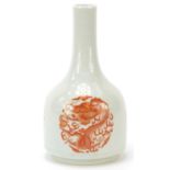 Chinese porcelain bottle vase hand painted in iron red with three dragons chasing a flaming pearl