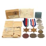 Four British military World War II medals and dog tags with two boxes : For Further Condition