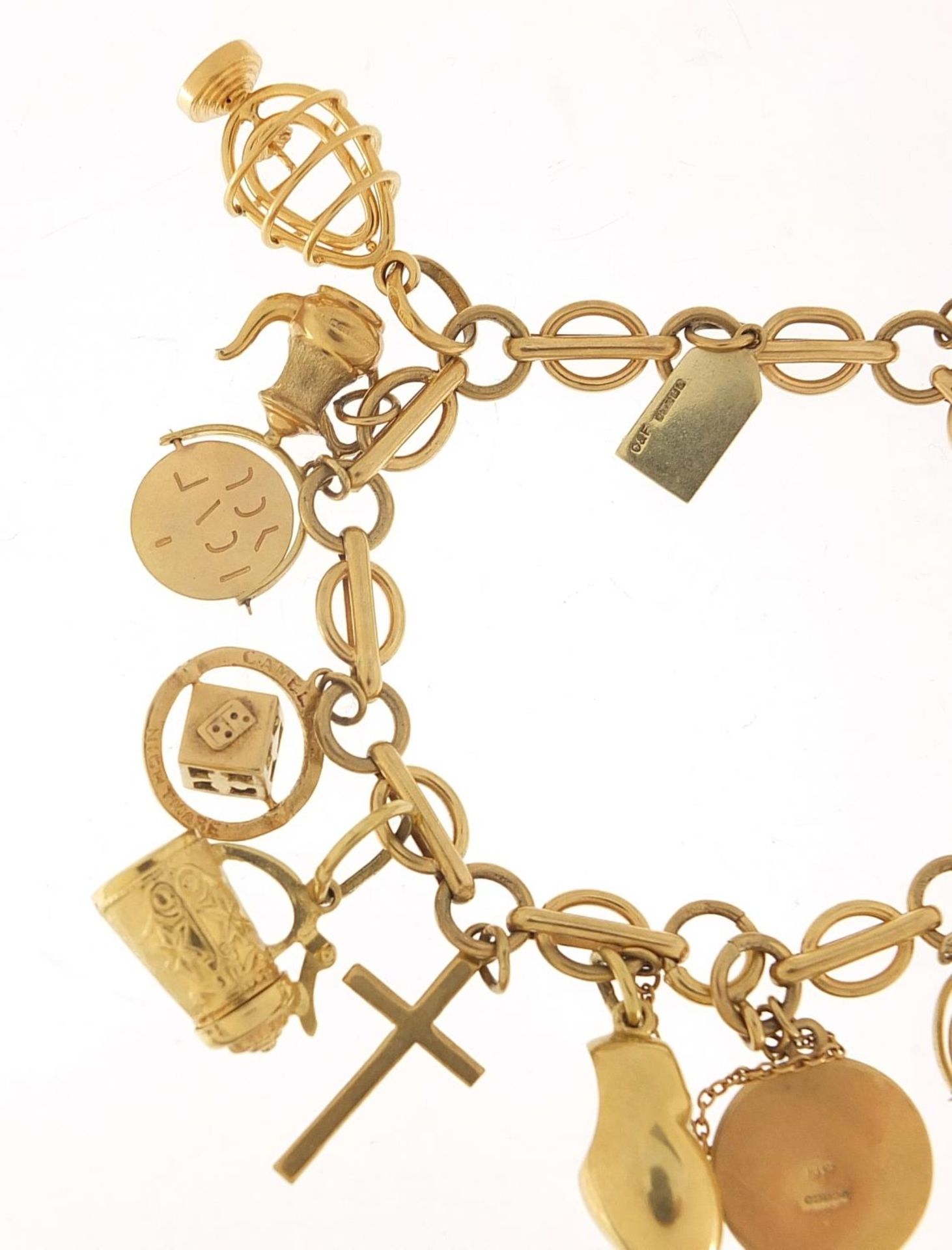 9ct gold charm bracelet with a selection of mostly gold charms including St Christopher, Dutch - Image 5 of 8