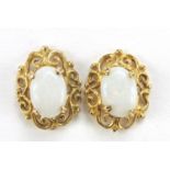 Pair of 9ct gold cabochon opal stud earrings, 1.1cm high, 1.4g : For Further Condition Reports