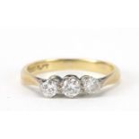 18ct gold and platinum diamond three stone ring, the central diamond approximately 2.8mm in